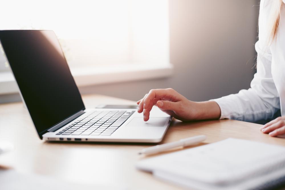 business-woman-working-on-laptop-in-her-office-picjumbo-com.jpg